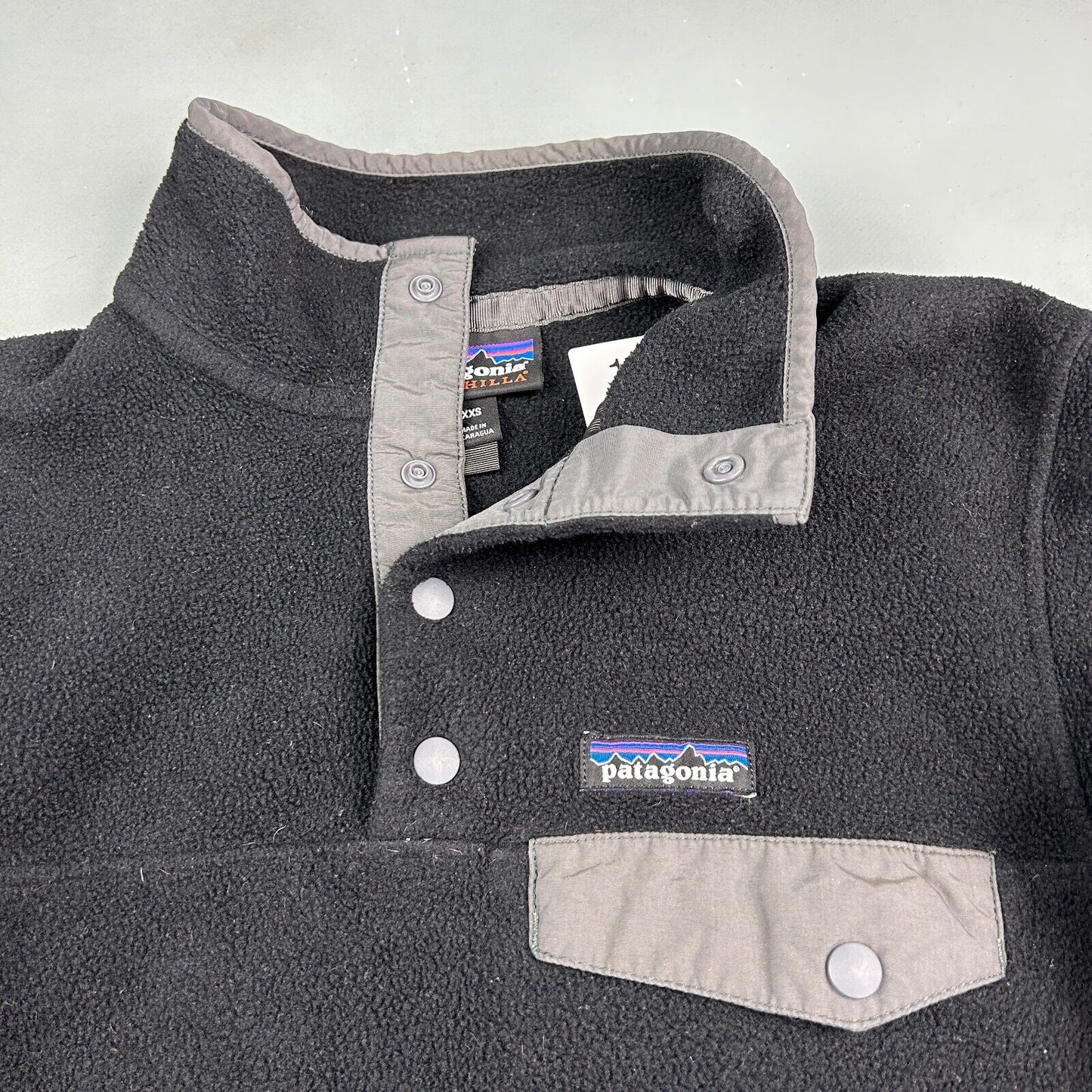 VINTAGE Patagonia Synchilla Snap T Black Fleece Sweater sz XXS Adult