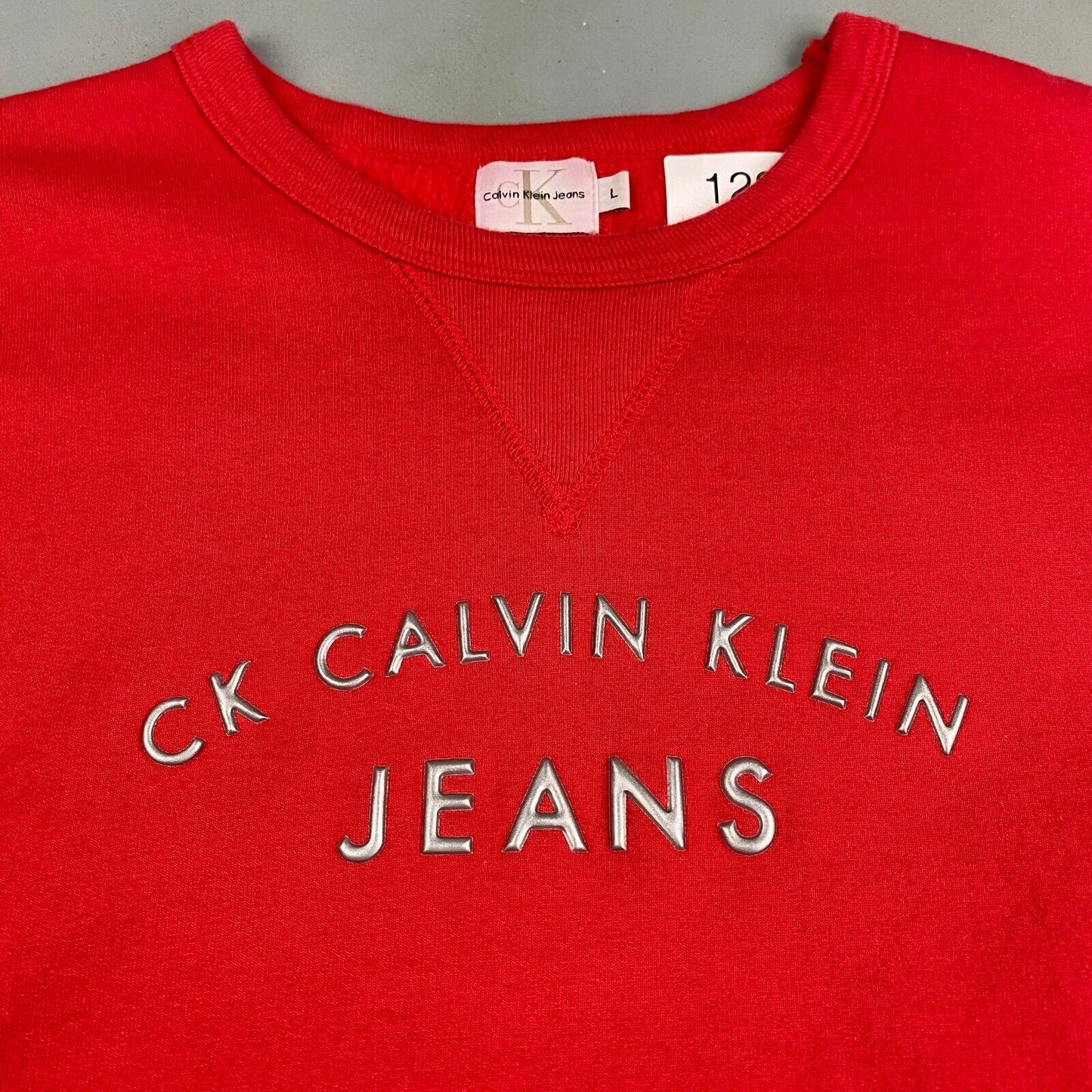 VINTAGE Calvin Klein Jeans Embossed Logo Red Sweater sz Large Womens