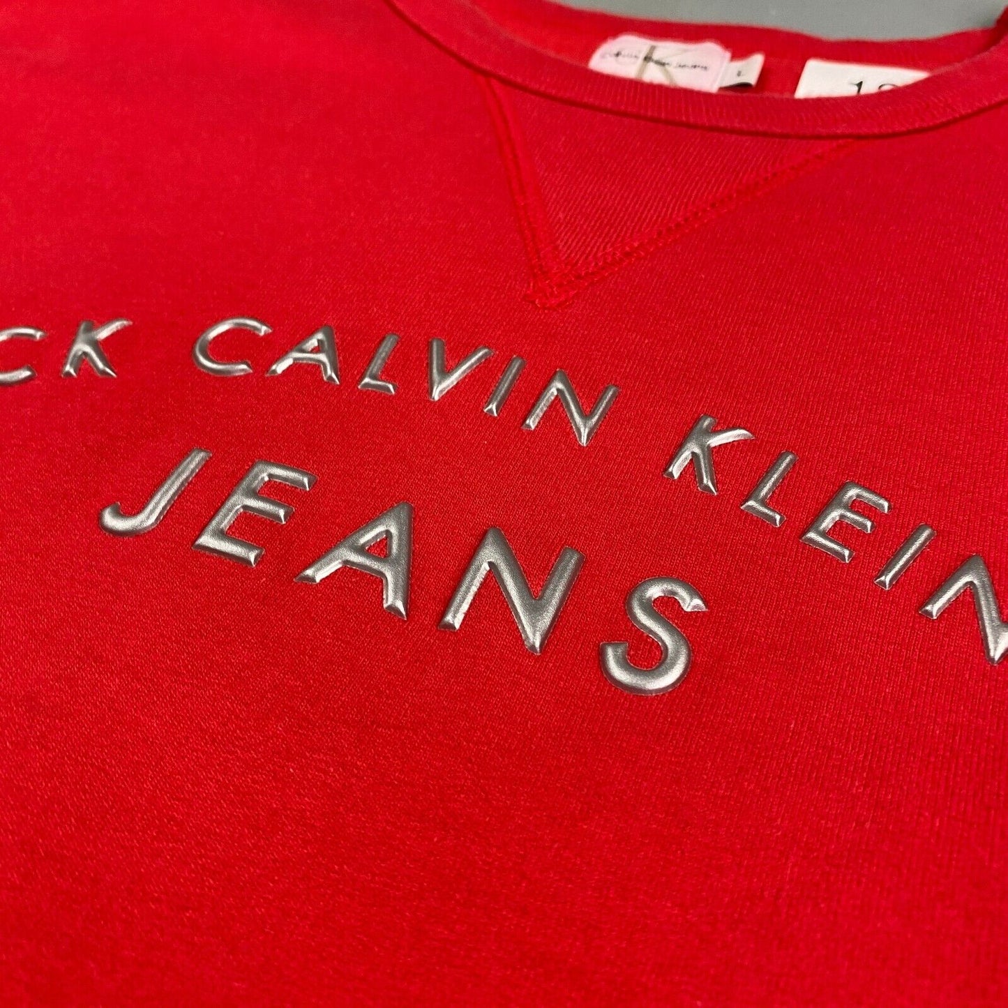 VINTAGE Calvin Klein Jeans Embossed Logo Red Sweater sz Large Womens