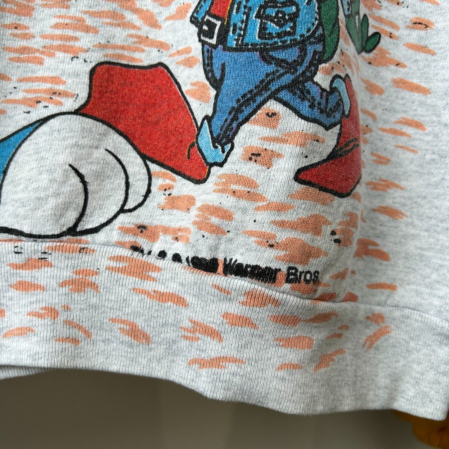 VINTAGE 90s | Looney Tunes Trippy Tiny Cartoon All Over Print Crew Sweater sz L